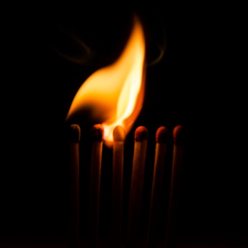Safety,Matches,Burning.,High,Contrast,With,A,Black,Background.,1x1